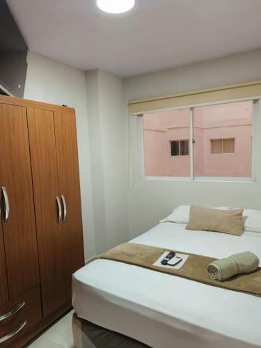 Llit o llits en una habitació de Elephant Lounge