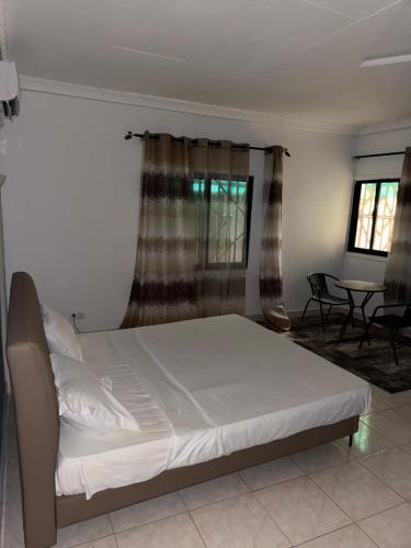 Llit o llits en una habitació de Home Jade