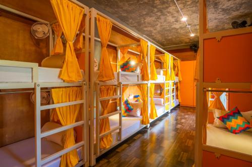 a group of bunk beds in a room at goSTOPS Pondicherry Near Auroville in Auroville