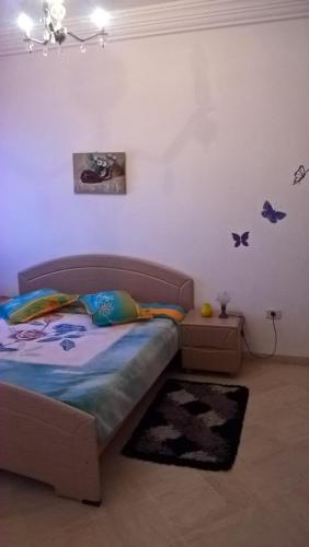 Llit o llits en una habitació de Residence Ghassen
