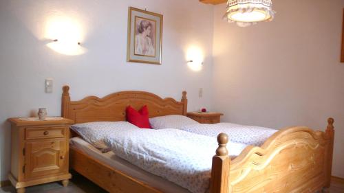 Ένα ή περισσότερα κρεβάτια σε δωμάτιο στο Alpenchalet Zum Jeremia