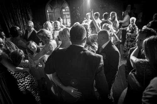 a black and white photo of a wedding ceremony at Hotel Victoria in Whitby