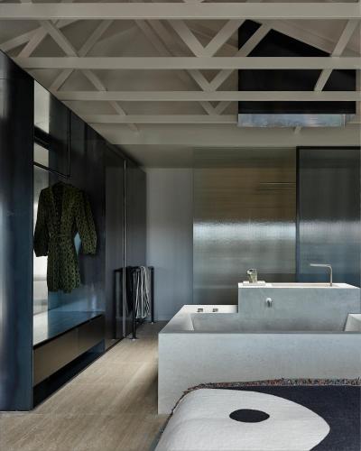 a bathroom with a white sink and a mirror at Bassano Red Hill in Red Hill