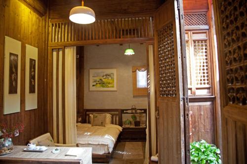 WuYuan QiYe YanXiang Guesthouseにあるシーティングエリア