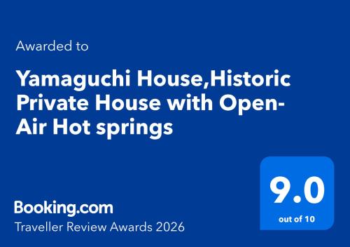 a blue sign with the words ayzaugh househistoric private house with open air at Yamaguchi House,Historic Private House with Open-Air Hot springs in Hakone