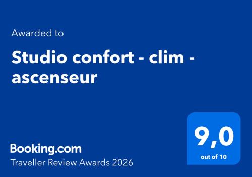 a blue sign with the words studio comfort gin and aamsignropheropherophe at Studio confort - clim - ascenseur in Cavaillon