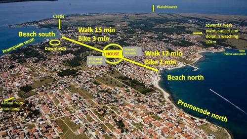 a map of a city with yellow arrows at House between beaches in Vir