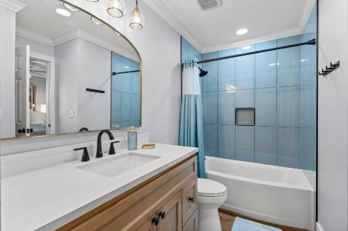 a bathroom with a sink and a toilet and a shower at C' Salt 10B in Destin