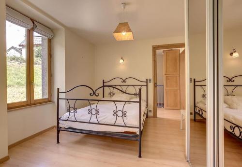Postel nebo postele na pokoji v ubytování Apartment Serenite
