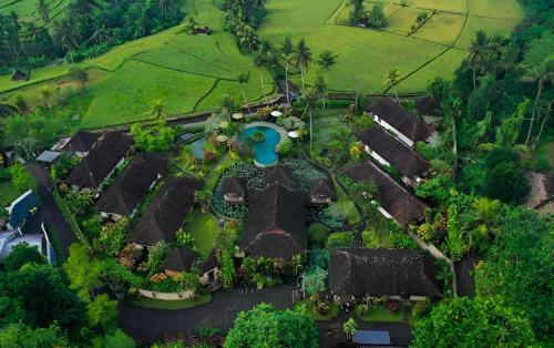 an aerial view of a resort with many roofs at Villa Taman di Blayu by AGATA in Tabanan