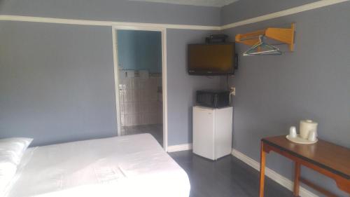 Katil atau katil-katil dalam bilik di Riviera Motel