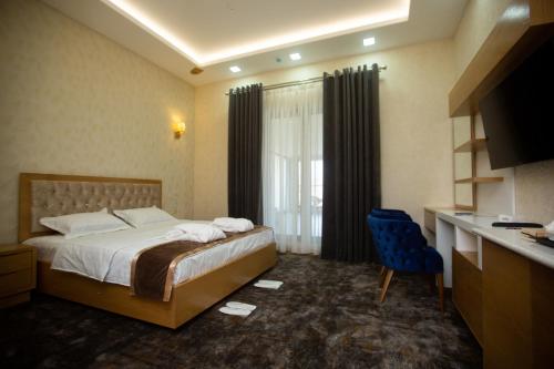 Katil atau katil-katil dalam bilik di Turon Resort