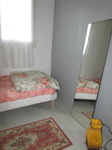 Llit o llits en una habitació de ZenHouse