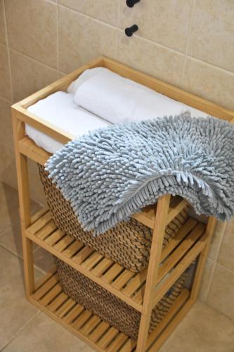 a towel rack with towels on it in a bathroom at Rincón Costero in Rincón de la Victoria