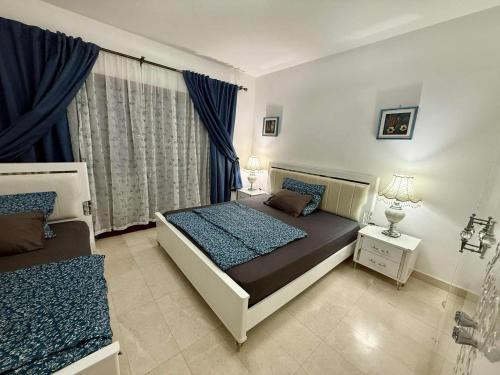 Postel nebo postele na pokoji v ubytování Dream Apartment
