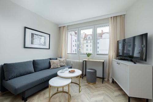 Foto Cozy Studio with Workspace in the City Center by Noclegi Renters 2