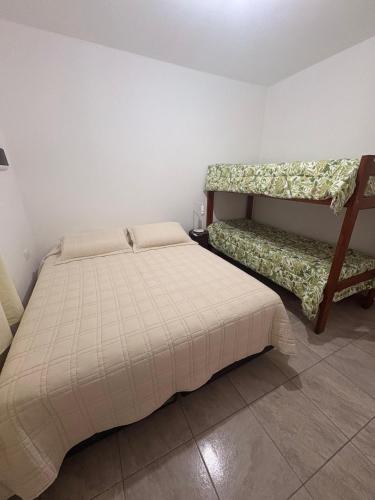 a bedroom with two beds in a room at Solares de Sabatini in Villa del Totoral