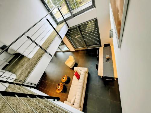 an overhead view of a living room with a couch at Villa in Meisenheim