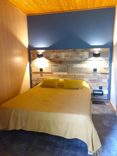 Llit o llits en una habitació de Nid Douillet