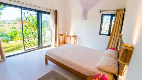 Llit o llits en una habitació de Green Palace