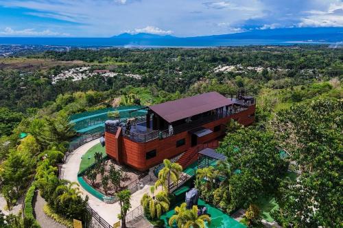 an aerial view of a house with a resort at Amaya View in Balulang