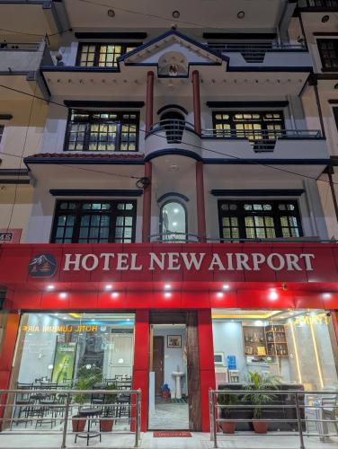 a hotel newport building with a sign on it at Hotel New Airport in Kathmandu