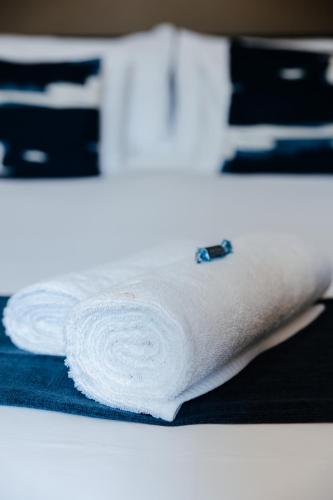 a roll of toilet paper sitting on top of a table at Uitsig Boutique Hotel in Welkom