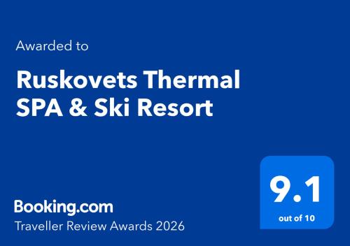 a blue sign with the textviks thermal spa and ski resort at Ruskovets Thermal SPA & Ski Resort in Bansko