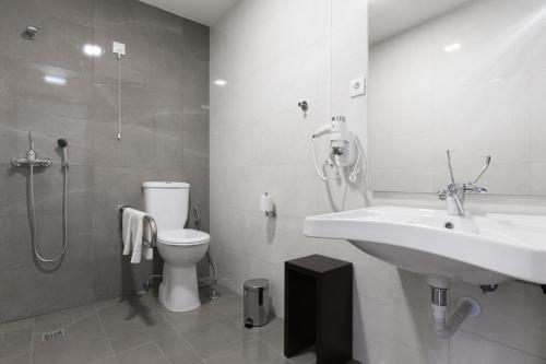 Een badkamer bij Fenicius Charme Hotel