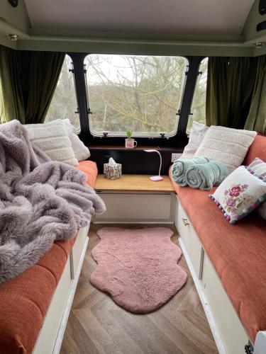 a room with two seats in the back of a van at Kerry Country House in Kilteean