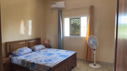เตียงในห้องที่ Maison d'Afrique