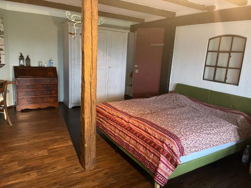 Postel nebo postele na pokoji v ubytování Ferienhaus Sonnenblick an der Nordsee