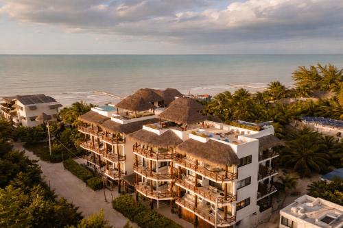 an aerial view of the hotel and the ocean at Casa Astral Hotel Boutique and Apartments in Holbox Island