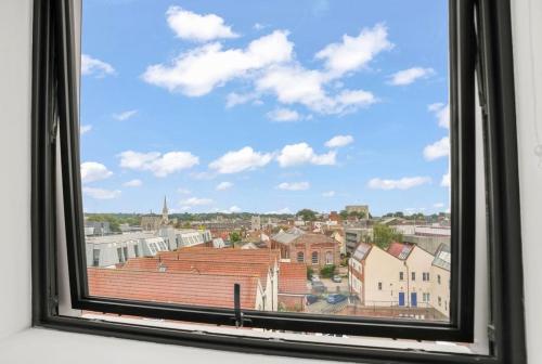 a window with a view of a city at City centre FREE Parking Families and Contractors Sleeps 5 with a view in Norwich