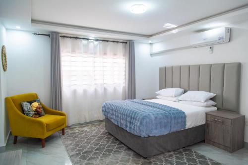 Lova arba lovos apgyvendinimo įstaigoje Ndola Pineview Luxury suites