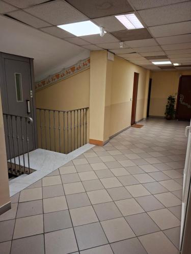 an empty hallway of an office building at Corso Garibaldi mansarda in Sanremo