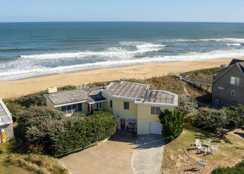 an aerial view of a house and the beach at Gypsea Rose - Southern Shores, Oceanfront, Ocean View, Hot Tub, Pets OK, Flex Stays in Southern Shores