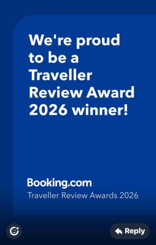 a text message with the words were proud to be a traveller review award winner at Dead Sea view Elite apartment Samara Resort traveler award 2026 in Sowayma