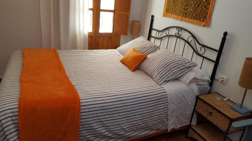 Giường trong phòng chung tại Holiday home La Atalaya de Vejer