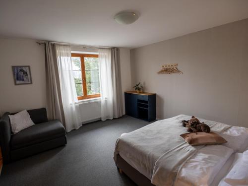 a bedroom with a bed with two teddy bears on it at Residence Sarka in Prague
