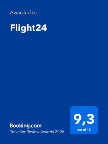 サン・フランソワにあるFlight24の「フライトにアップグレード」というテキストが表示された携帯電話のスクリーンショット