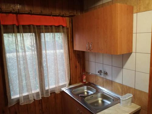 Kuchyň nebo kuchyňský kout v ubytování Kéri Apartman