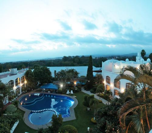 an aerial view of a resort with a swimming pool at Villa Bejar Cuernavaca in Cuernavaca