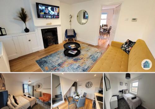 a living room with a couch and a fireplace at Little Oaks House - Historic Charm & Modern Comfort in Colchester by Catchpole Stays in Colchester