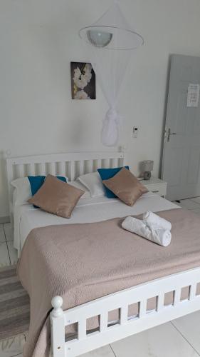 Llit o llits en una habitació de Villa les Alizés