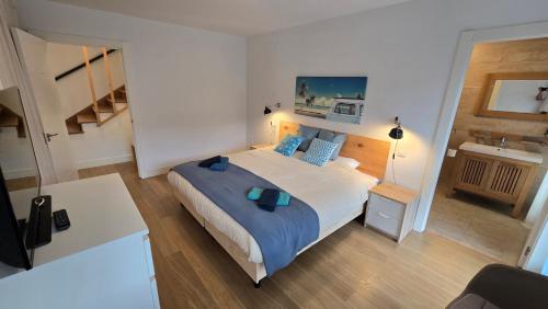 Llit o llits en una habitació de Laga Blue Surf
