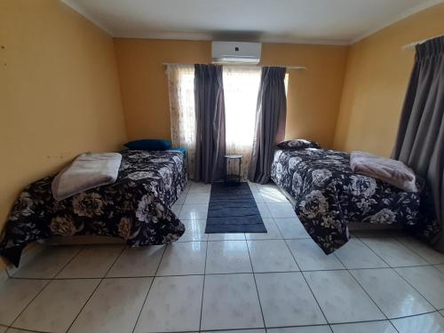 Llit o llits en una habitació de Abodes at 113