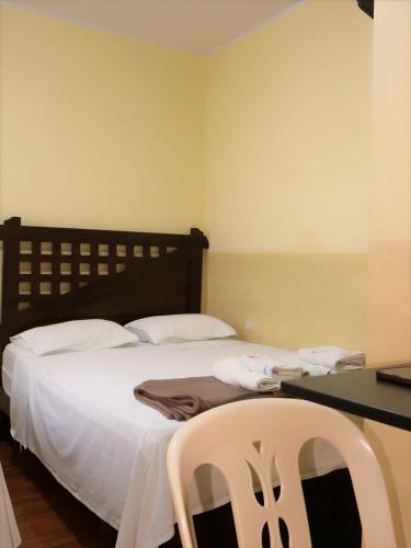 Llit o llits en una habitació de Peruvian Wasi - Bed & Breakfast