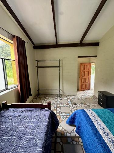 Llit o llits en una habitació de El Bambuzal