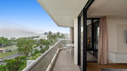a balcony with a view of the ocean at The Condo at Northshore Tower in Cairns North